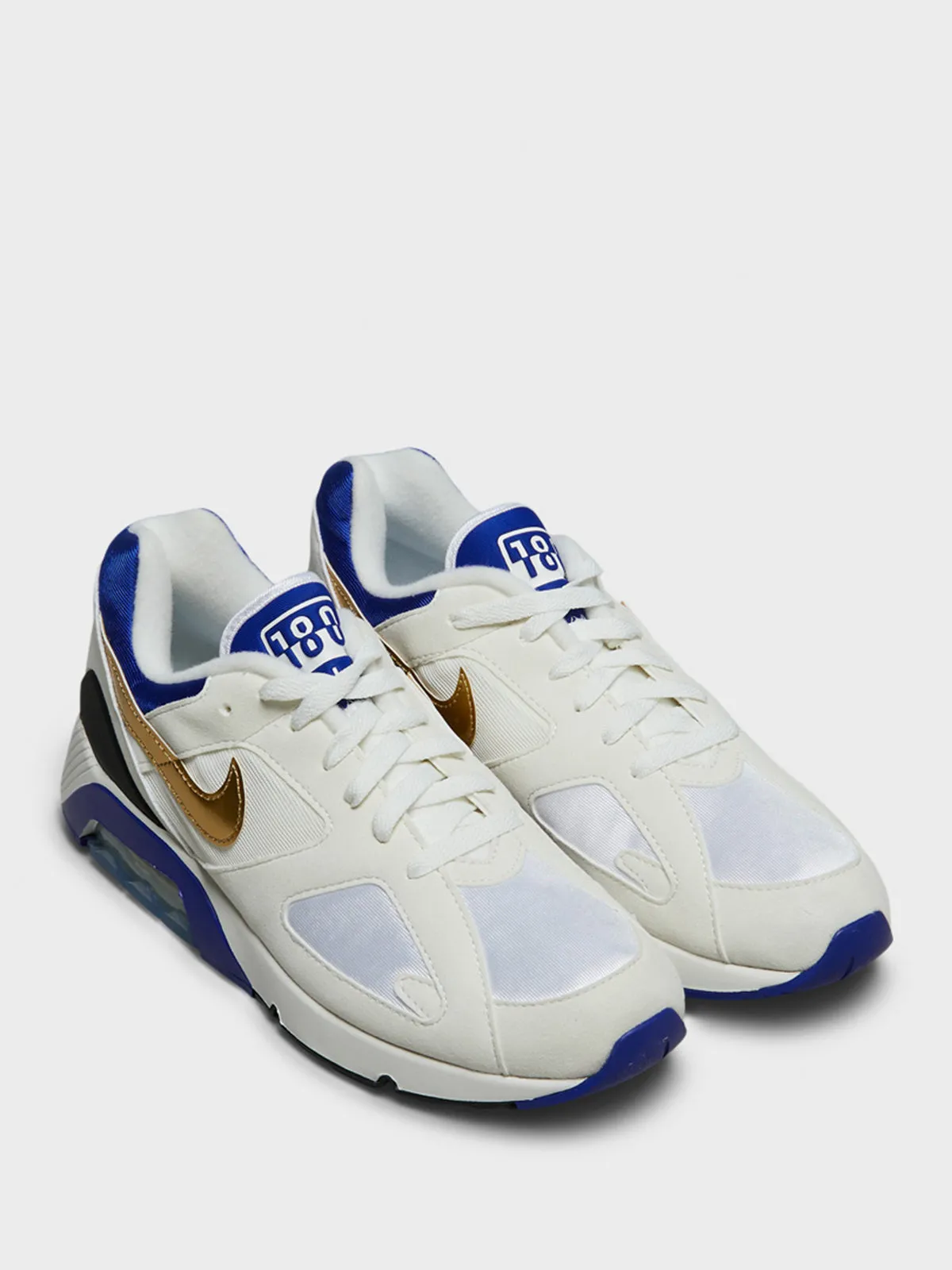 Air 180 Sneakers in Summit White and Metallic Gold